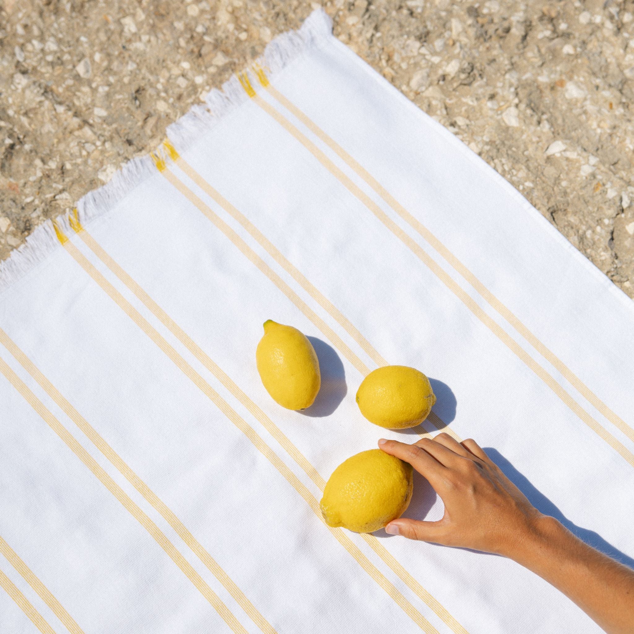 torres-novas-beach-caparica-vertical-stripes-towel-yellow-lifestyle-7.jpg