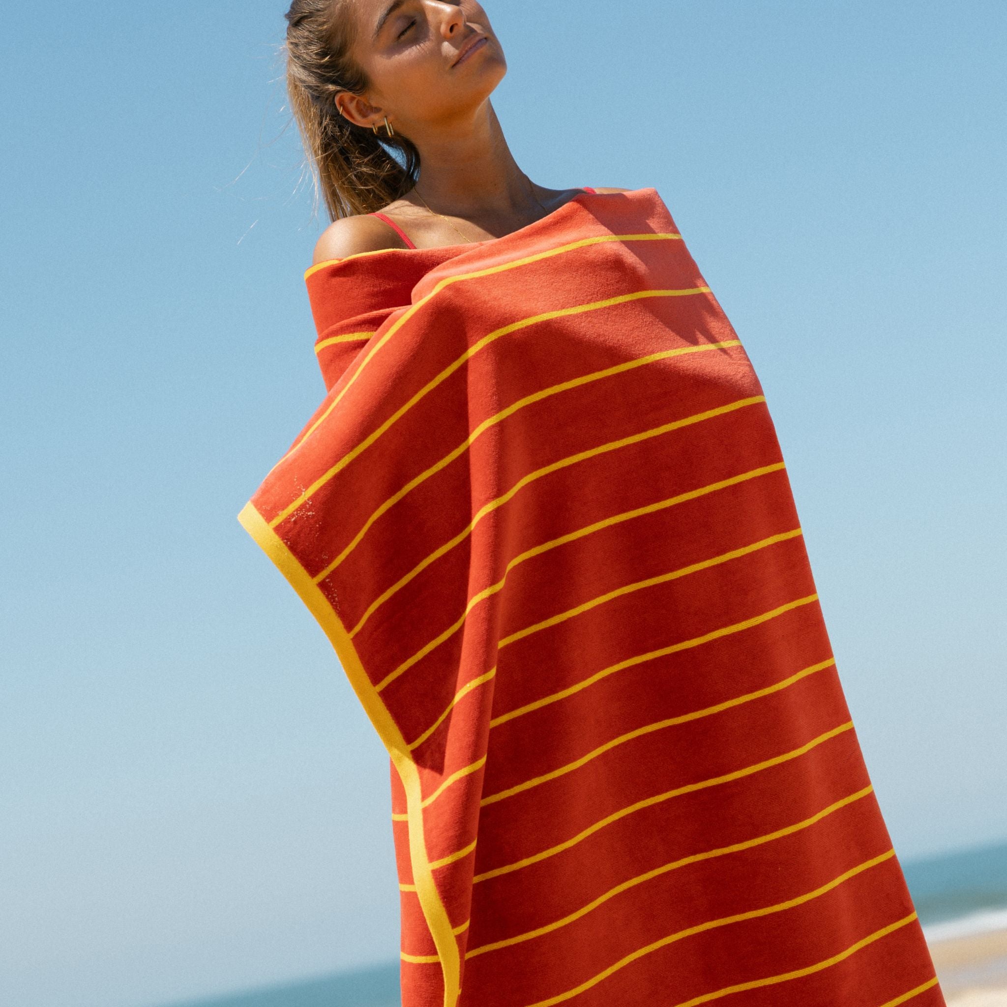 torres-novas-beach-pena-vertical-stripes-towel-yellow-lifestyle-6.jpg