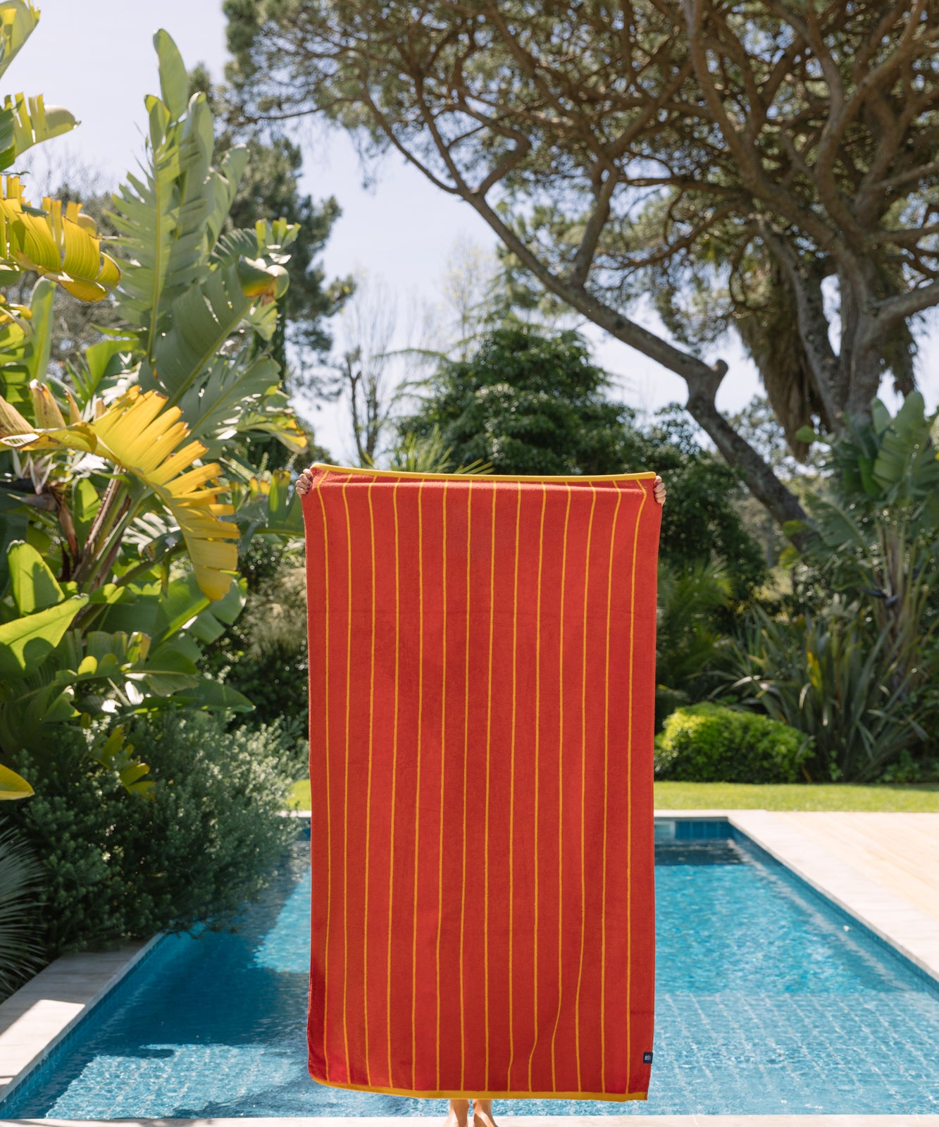 torres-novas-pena-reversible-beach-towels-vertical-stripes-product-yellow-orange-3.jpg