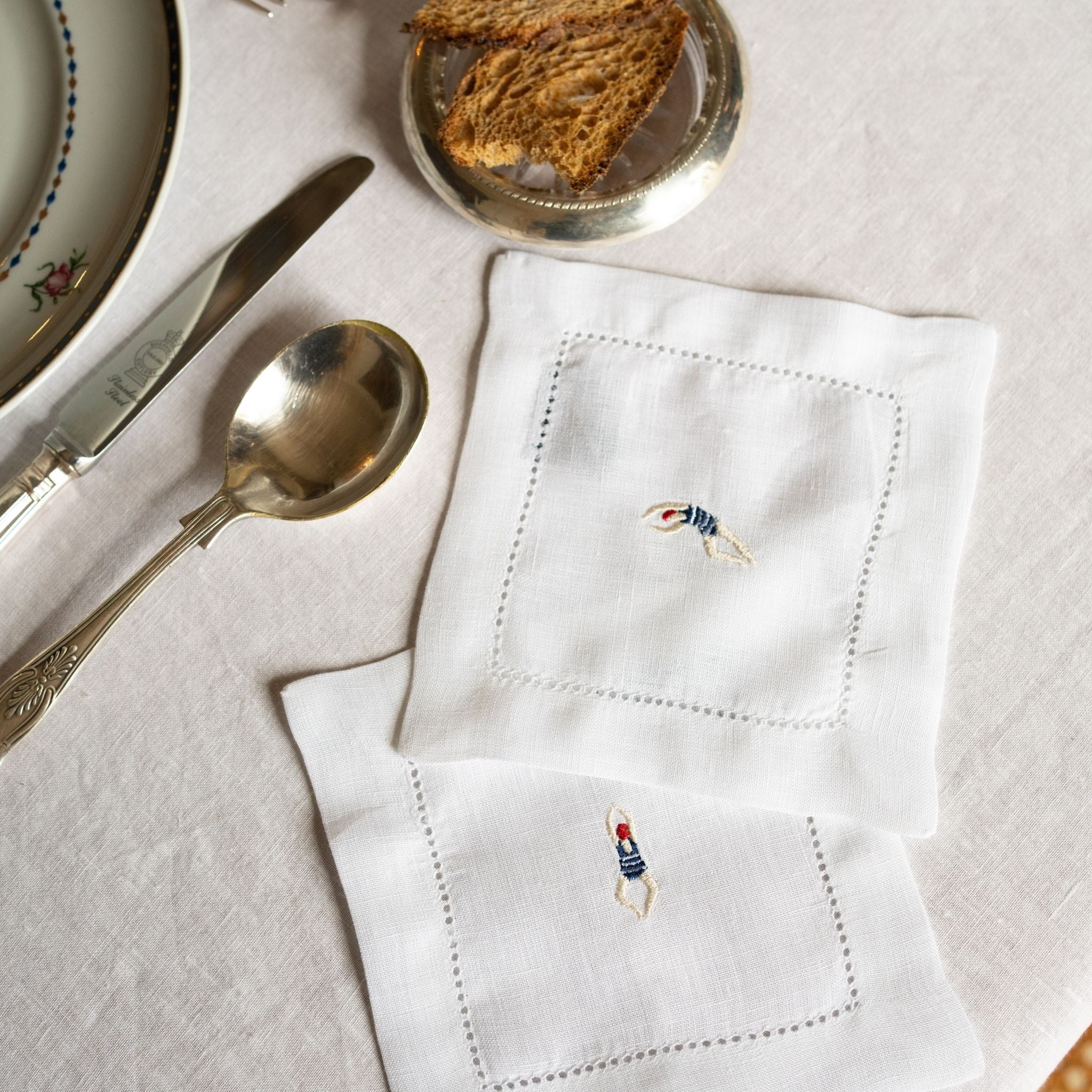 torres-novas-table-mafra-embroidery-summer-cocktail-napkin-swimmers-lifestyle-5.jpg