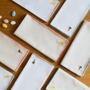 Linge de table Nazaré blanche, en coton, avec des motifs de Pâques brodés